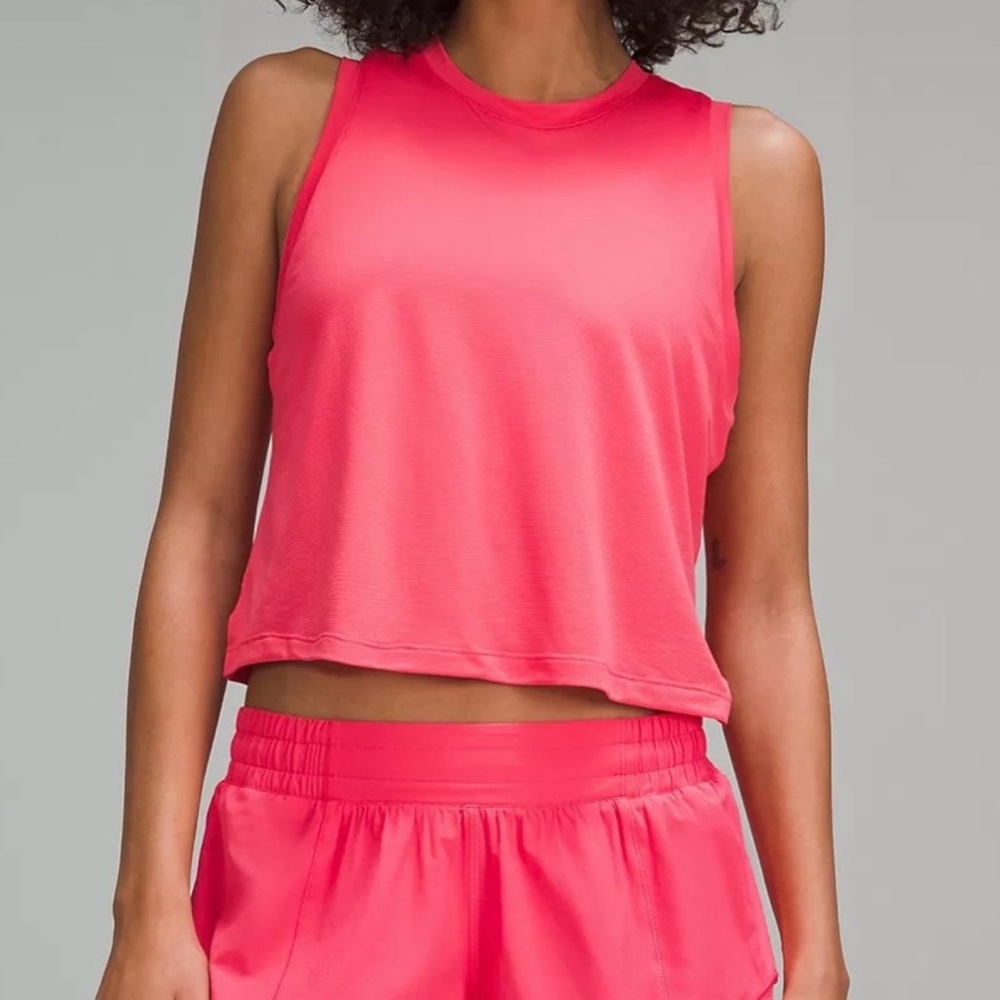 Lululemon Ultralight Waist Length Tank.  Glaze Pink. Size 6.  Worn twice. EUC.